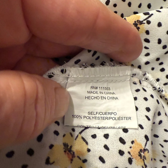 Lily White v neck top with black design with yellow flowers. Hi-Lo Size Medium - Picture 7 of 8